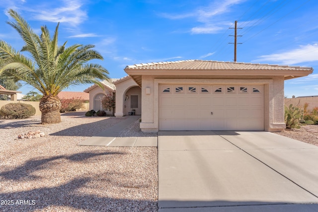 view of front of home featuring a garage