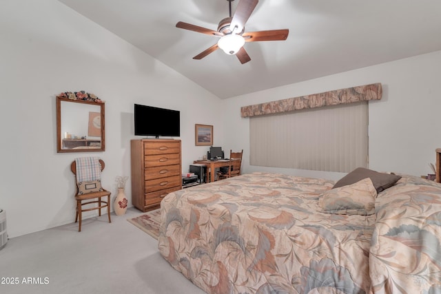 carpeted bedroom with lofted ceiling and ceiling fan