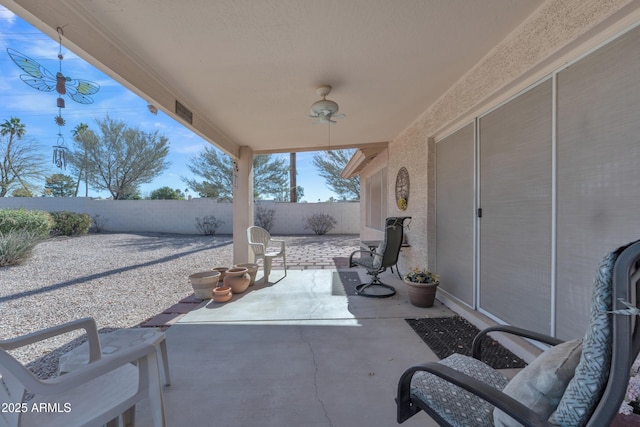 view of patio with ceiling fan