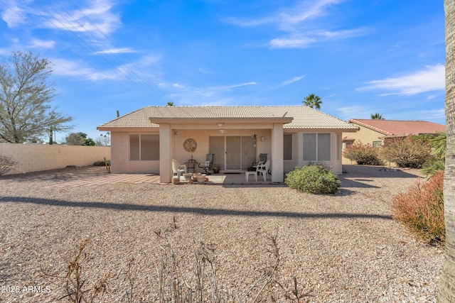 rear view of property with a patio area