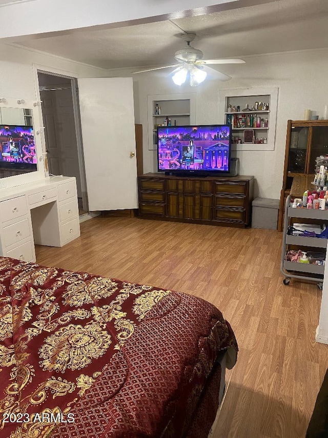 bedroom featuring ceiling fan and light wood-type flooring