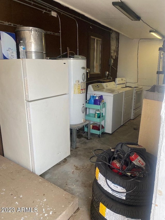 interior space with water heater and independent washer and dryer