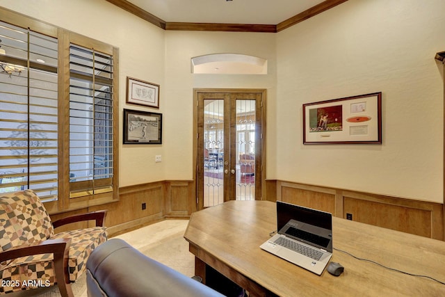 office area featuring ornamental molding, french doors, and wainscoting