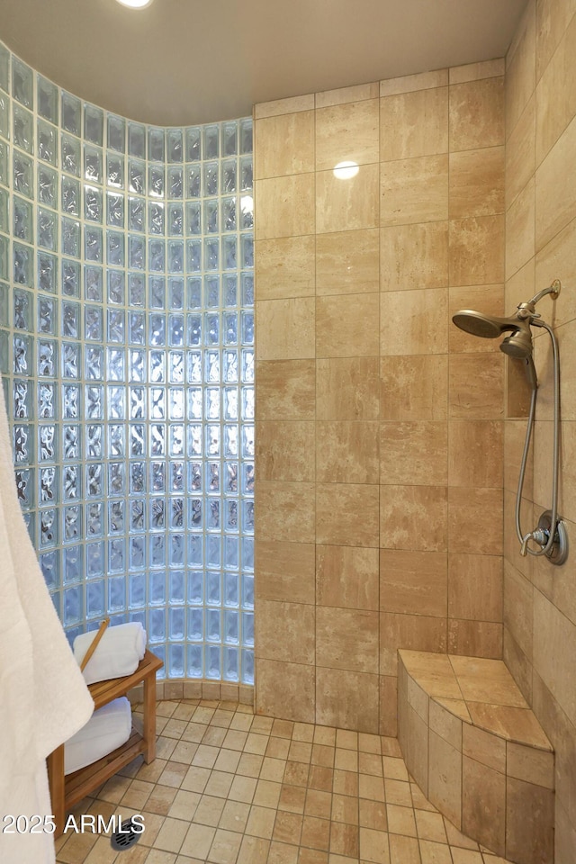 bathroom featuring tiled shower