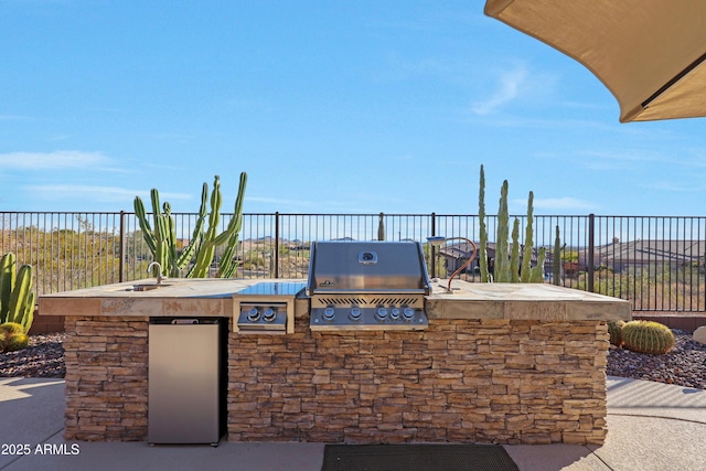 view of patio / terrace with fence, grilling area, and area for grilling