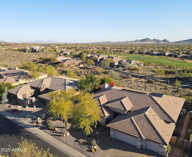 birds eye view of property with a residential view and a mountain view