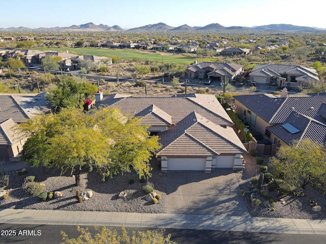 drone / aerial view with a residential view and a mountain view