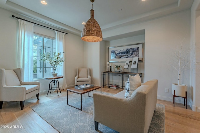 living area with light hardwood / wood-style flooring