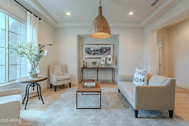 sitting room featuring hardwood / wood-style floors