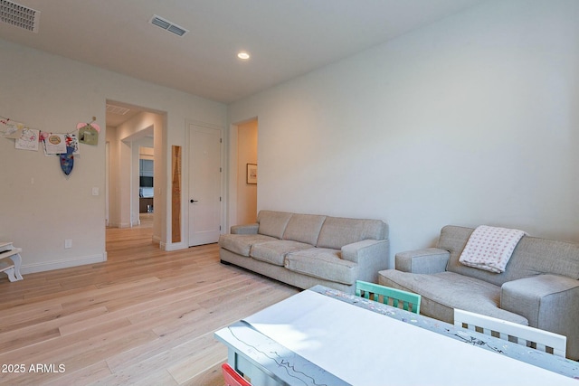 living room with light wood-type flooring