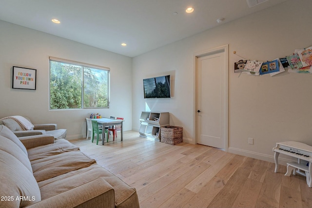 living room featuring light wood-type flooring