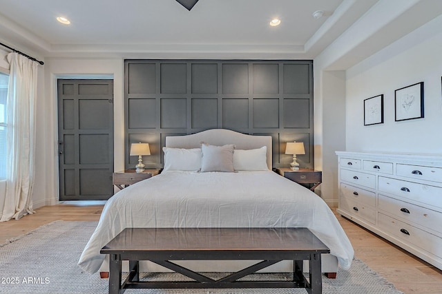 bedroom with light wood-type flooring