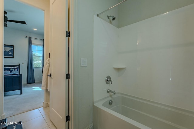 bathroom with shower / tub combination, tile patterned floors, and ceiling fan