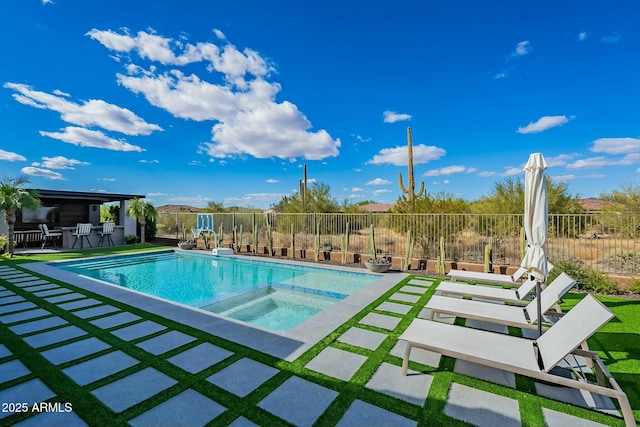 view of swimming pool featuring a bar and an in ground hot tub