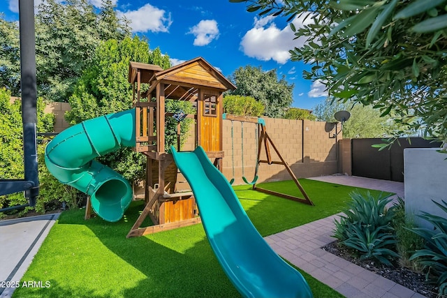 view of playground featuring a yard