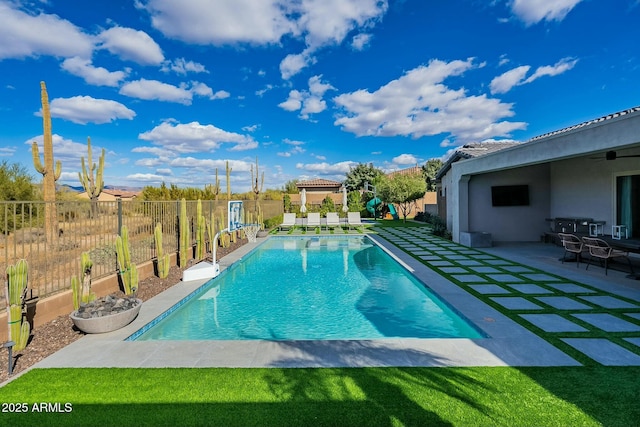 view of swimming pool featuring a patio