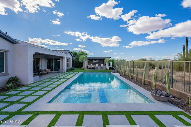 view of pool featuring a patio area and an outdoor bar