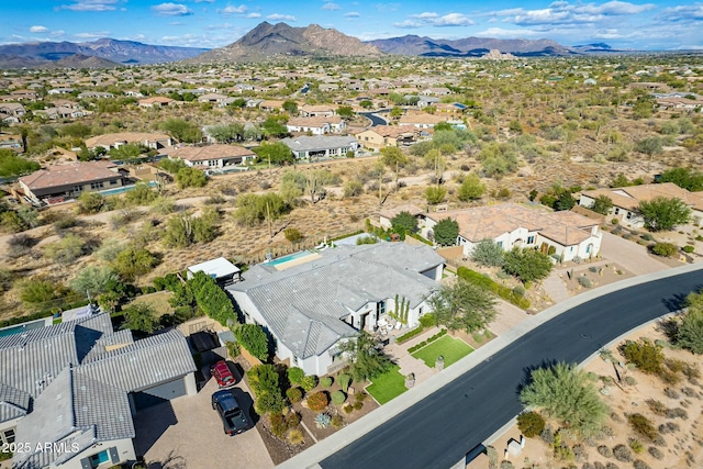 bird's eye view with a mountain view