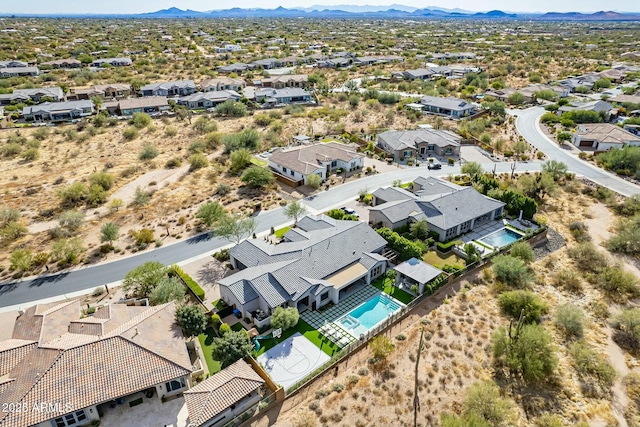 drone / aerial view featuring a mountain view