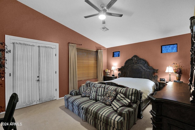 carpeted bedroom featuring ceiling fan and lofted ceiling