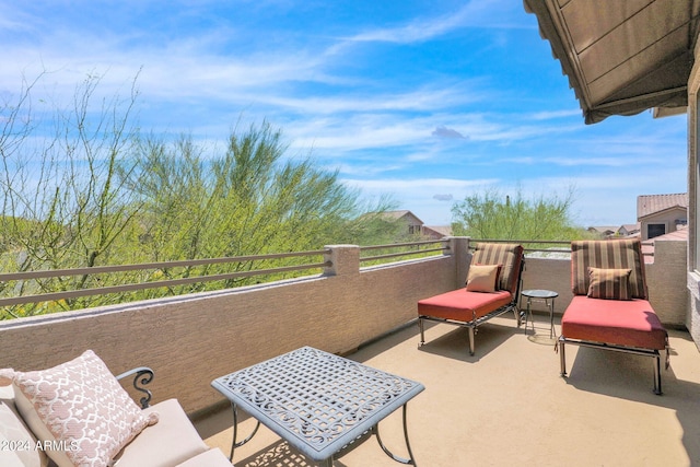 view of patio with a balcony