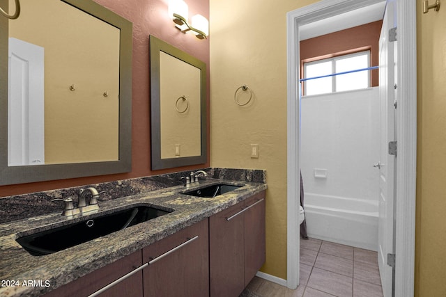 full bathroom featuring vanity, tile patterned flooring, toilet, and shower / bath combination