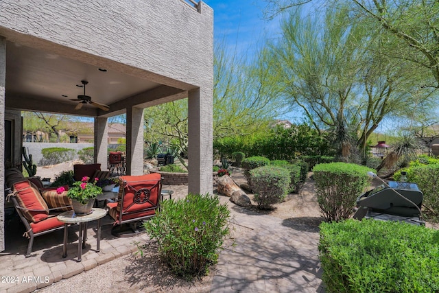 view of patio with ceiling fan