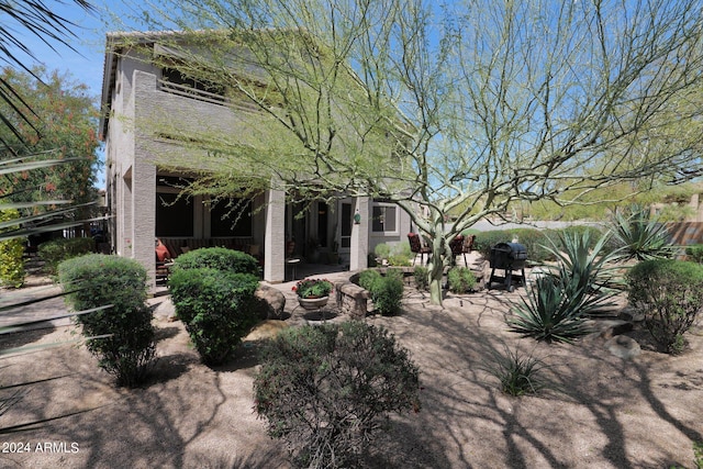 view of side of home featuring a patio area