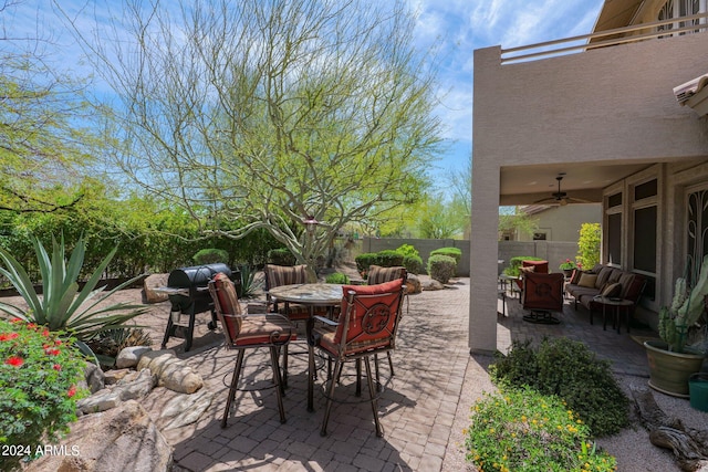 view of patio with ceiling fan