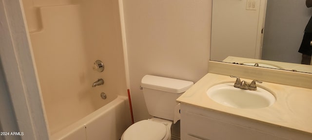 full bathroom featuring vanity, toilet, and  shower combination