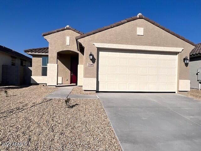 view of front of property featuring a garage