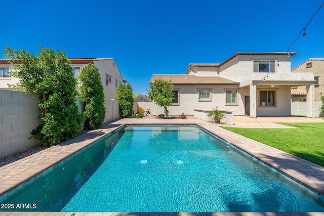 view of swimming pool featuring a fenced in pool, a patio area, and a fenced backyard