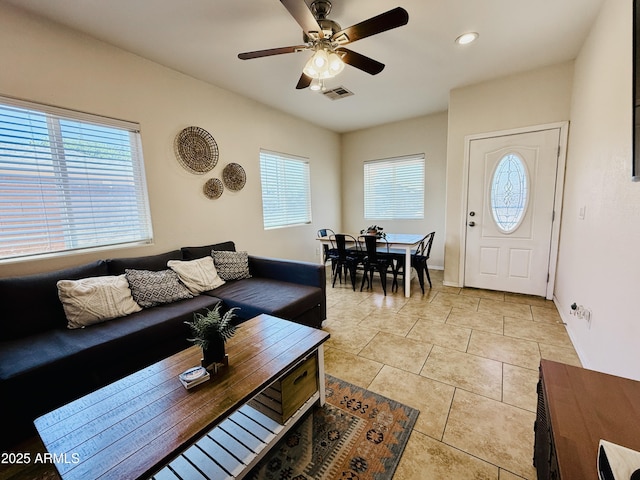 719 S 2nd St, Avondale, AZ 85323 - living room featuring light tile patterned flooring and ceiling fan