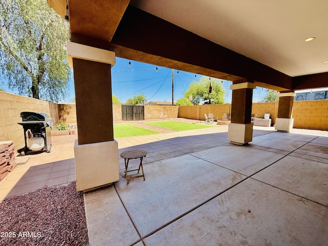 719 S 2nd St, Avondale, AZ 85323 - fenced backyard with area for grilling and a patio area