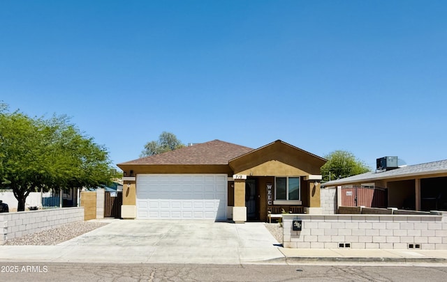 719 S 2nd St, Avondale, AZ 85323 - ranch-style home with a garage, concrete driveway, and stucco siding