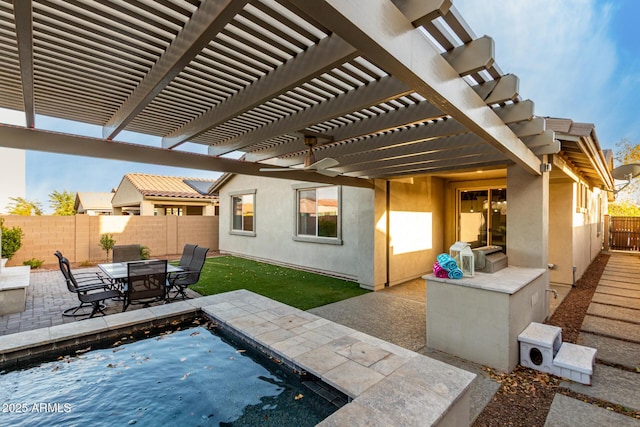 view of patio featuring outdoor dining area, a fenced backyard, and a pergola