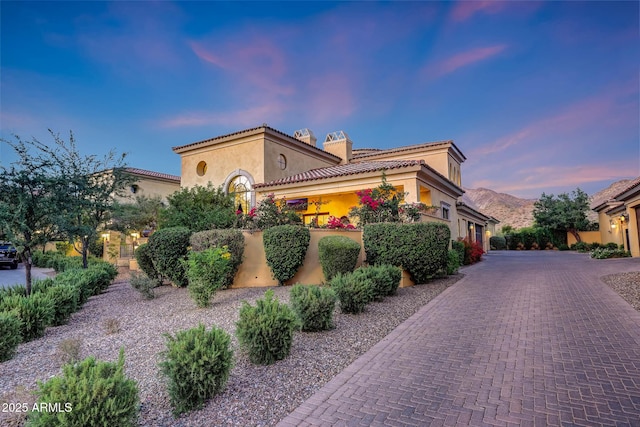 18927 N 101st St, Scottsdale, AZ 85255 - mediterranean / spanish-style house featuring stucco siding, a tile roof, and driveway