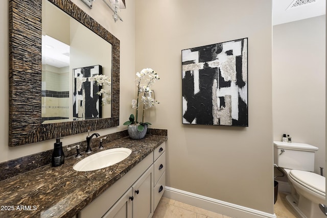 18927 N 101st St, Scottsdale, AZ 85255 - bathroom with tile patterned flooring, toilet, vanity, and baseboards
