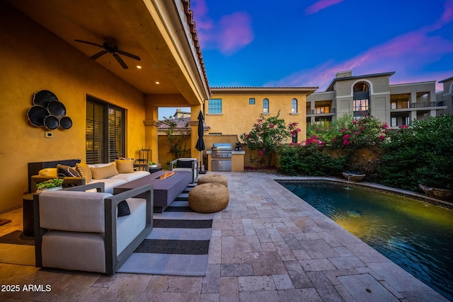 18927 N 101st St, Scottsdale, AZ 85255 - view of patio featuring exterior kitchen, ceiling fan, an outdoor living space, an outdoor pool, and grilling area