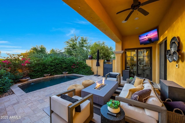 18927 N 101st St, Scottsdale, AZ 85255 - view of patio featuring ceiling fan and an outdoor living space with a fire pit