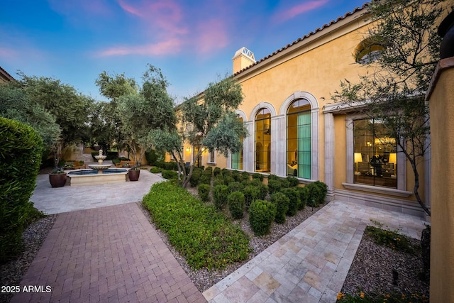 18927 N 101st St, Scottsdale, AZ 85255 - view of patio terrace at dusk