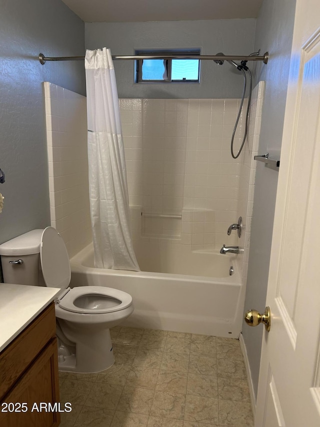 full bathroom featuring shower / bath combination with curtain, vanity, and toilet