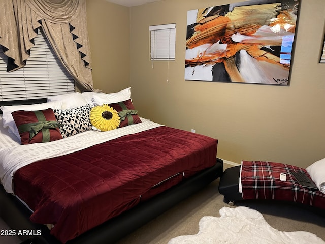 bedroom featuring carpet