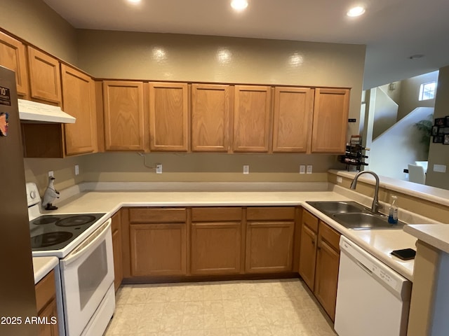 kitchen with white appliances and sink