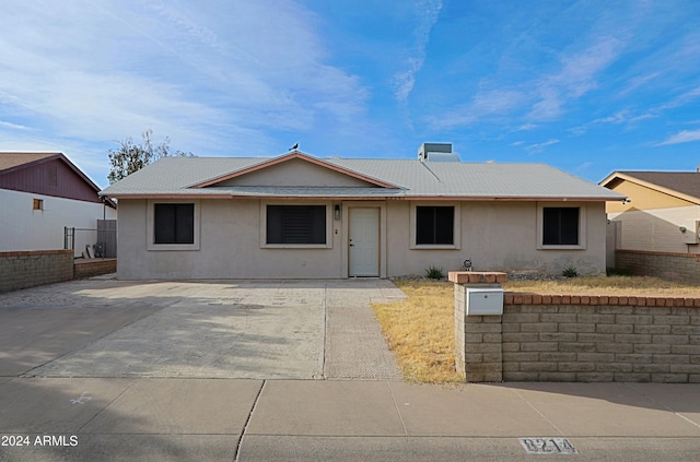 ranch-style house featuring a patio