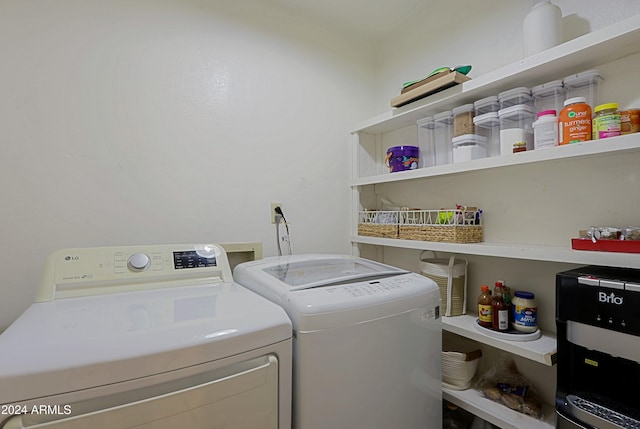 clothes washing area with independent washer and dryer