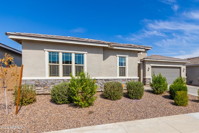 prairie-style home with a garage