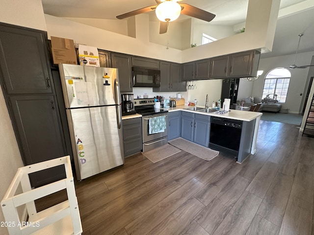 1718 S Longmore St Unit 53, Mesa, AZ 85202 - kitchen featuring black appliances, ceiling fan, light countertops, open floor plan, and a peninsula
