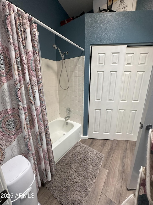 1718 S Longmore St Unit 53, Mesa, AZ 85202 - bathroom featuring shower / tub combo and wood finished floors