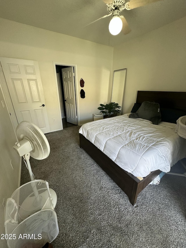 1718 S Longmore St Unit 53, Mesa, AZ 85202 - bedroom featuring dark carpet and ceiling fan